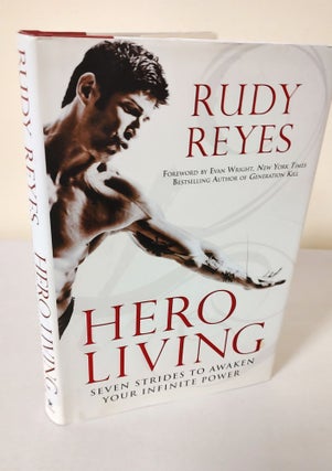 Item #12236 Hero Living; seven strides to awaken your infinite power. Rudy Reyes, Angela Smith